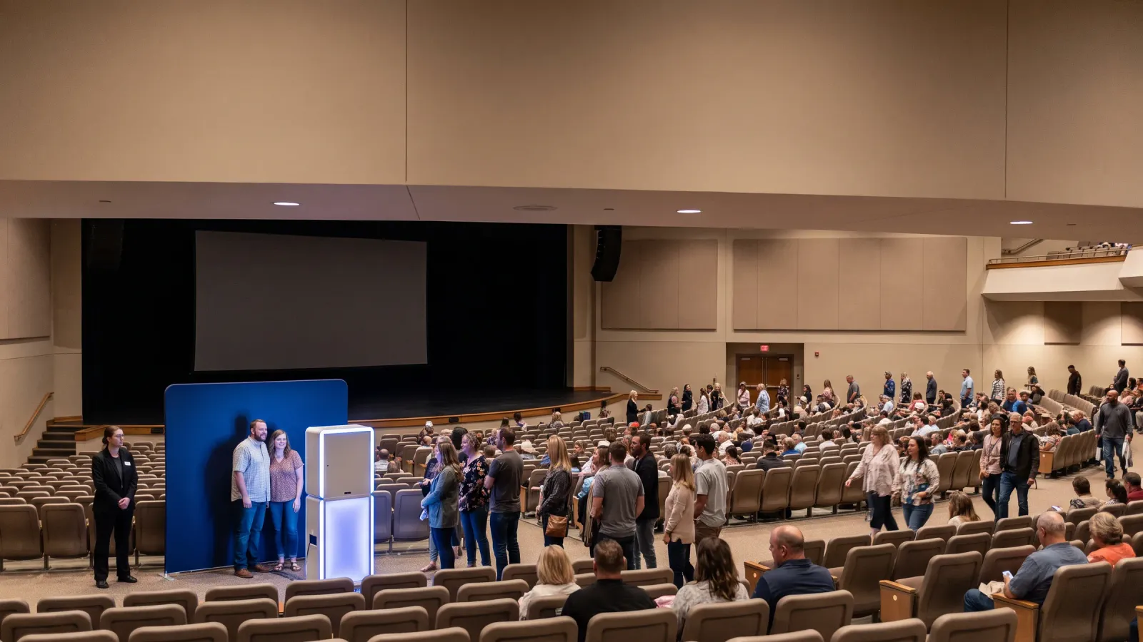 A single high-production photo installation at an evening launch event, staff on hand